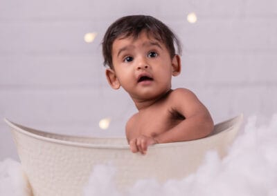 Varun Aadhitya's Newborn Photography by Adithi Media in Karur – Capturing precious newborn moments with warmth and creativity.